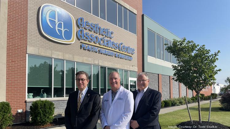 Dr. Todd Shatkin, center, shown with Daemen College executives Gary Olson and Michael Brogan